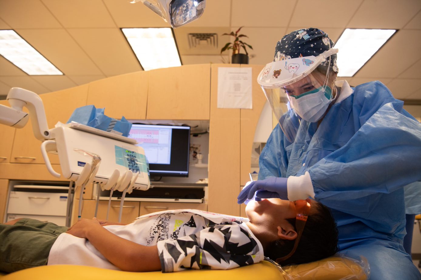 Image of dental student and patient