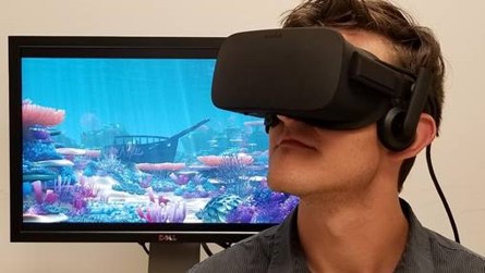 Man with virtual reality headgear