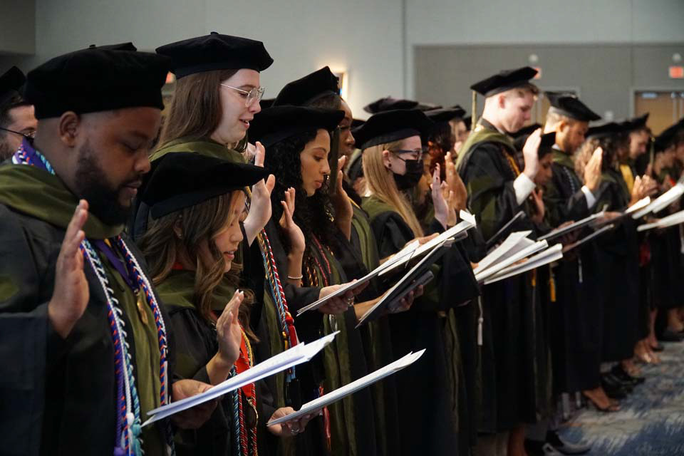 PharmD Class of 2022 reading the Pharmacists Oath