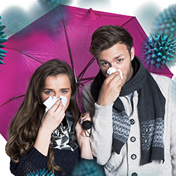 two people with tissue and purple umbrella