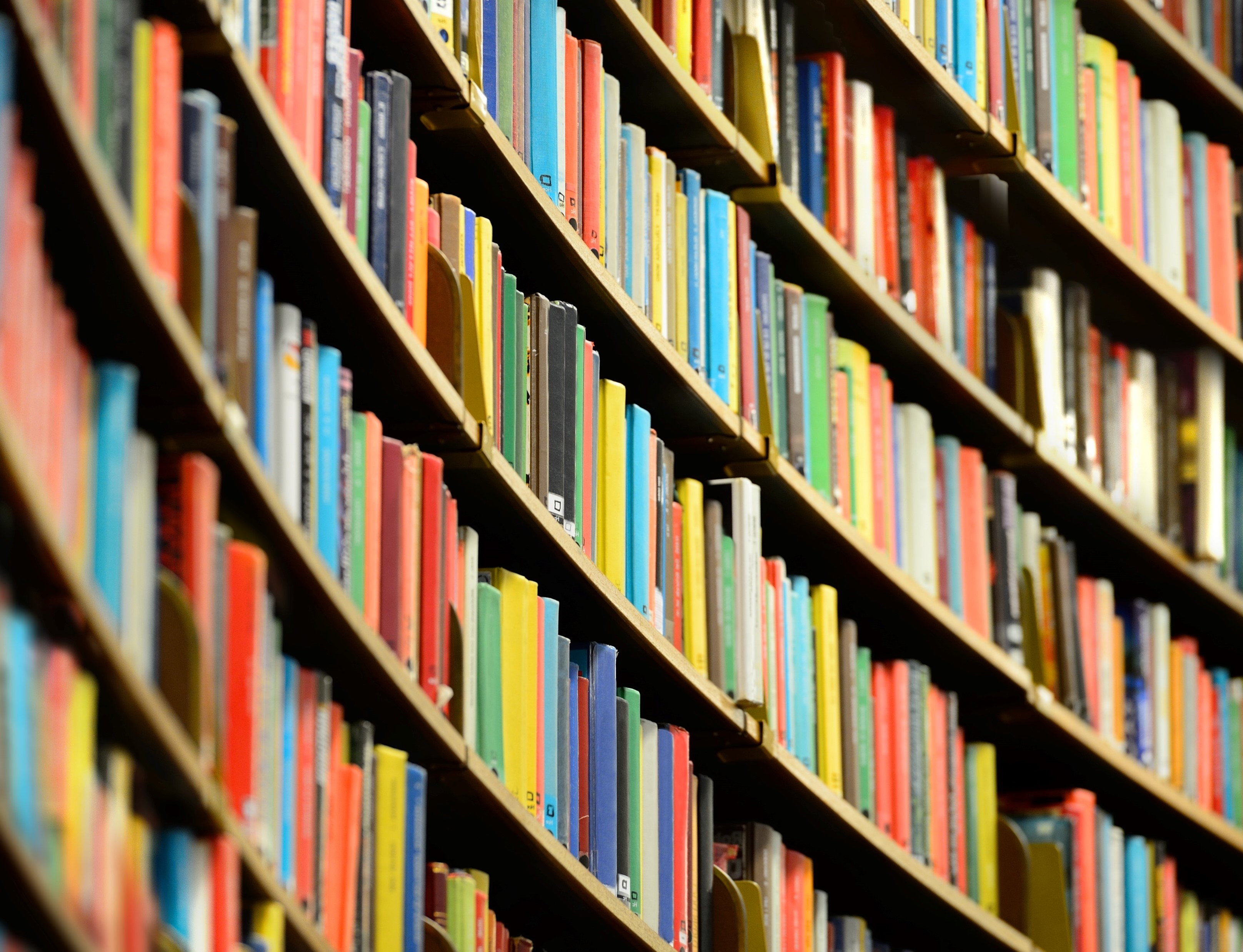 Book shelves with multi-colored books