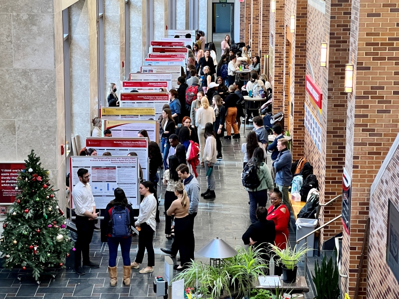 photo of poster session in lobby, shot from above