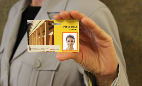 image of person holding One Card