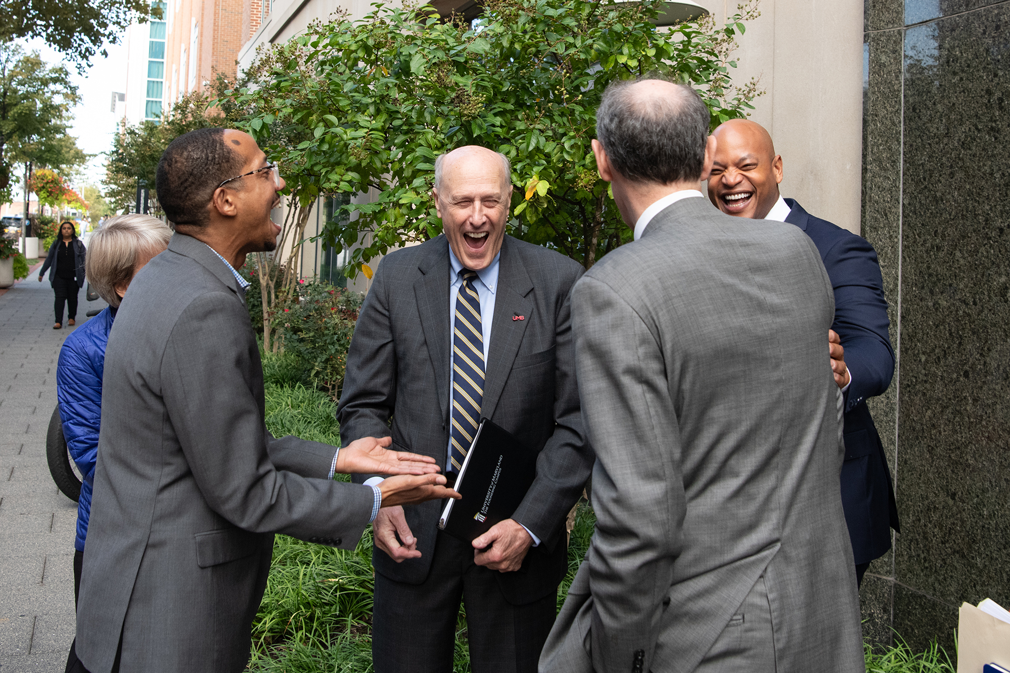 UMB President Bruce Jarrell and others are surprised by Gov. Wes Moore (right) as he arrives to spend part of his day at the UM BioPark
