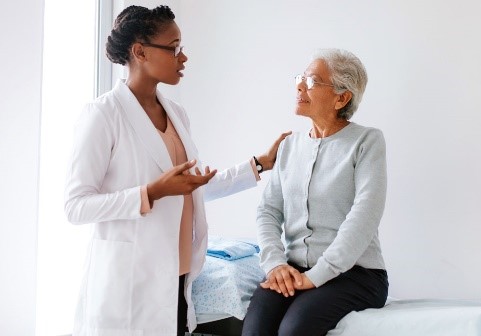 Physician Speaking to Patient