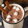 hot cocoa in a mug with marshmallows floating on top