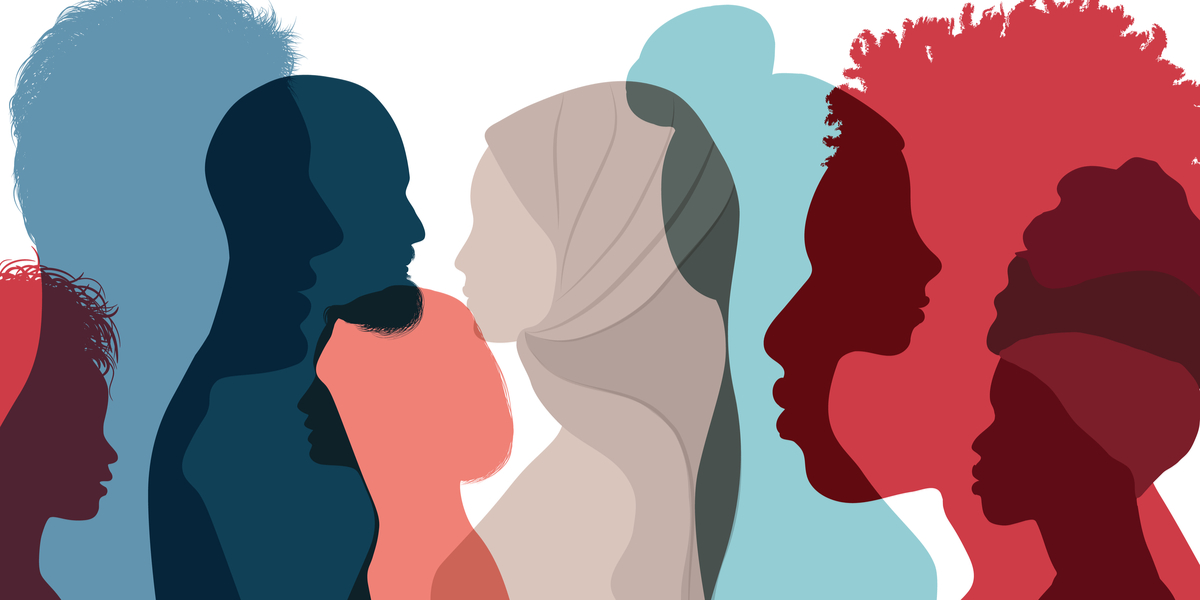 Silhouettes of diverse profiles in different colors and overlapping, representing varied genders, ethnicities, and cultural backgrounds.