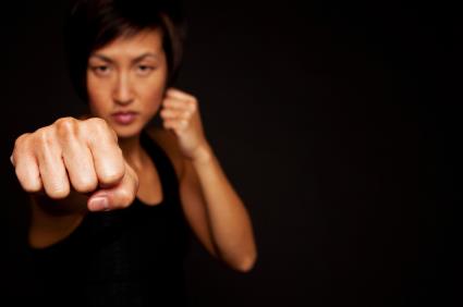 Woman practicing self defense