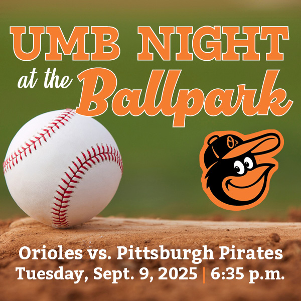 UMB Night at Oriole Park with Orioles log and baseball on a pitcher's mound