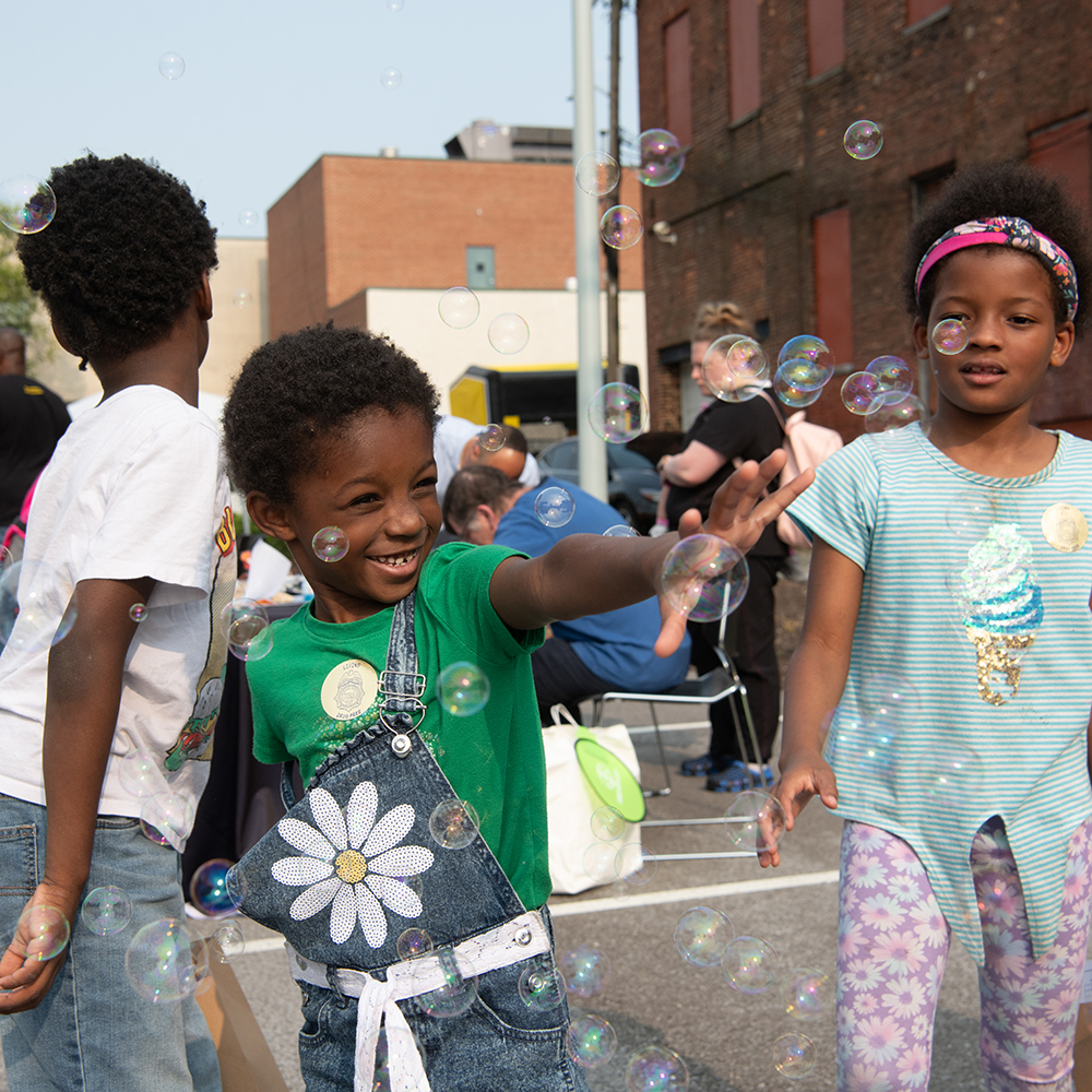 Kids play with bubbles at National Night Out