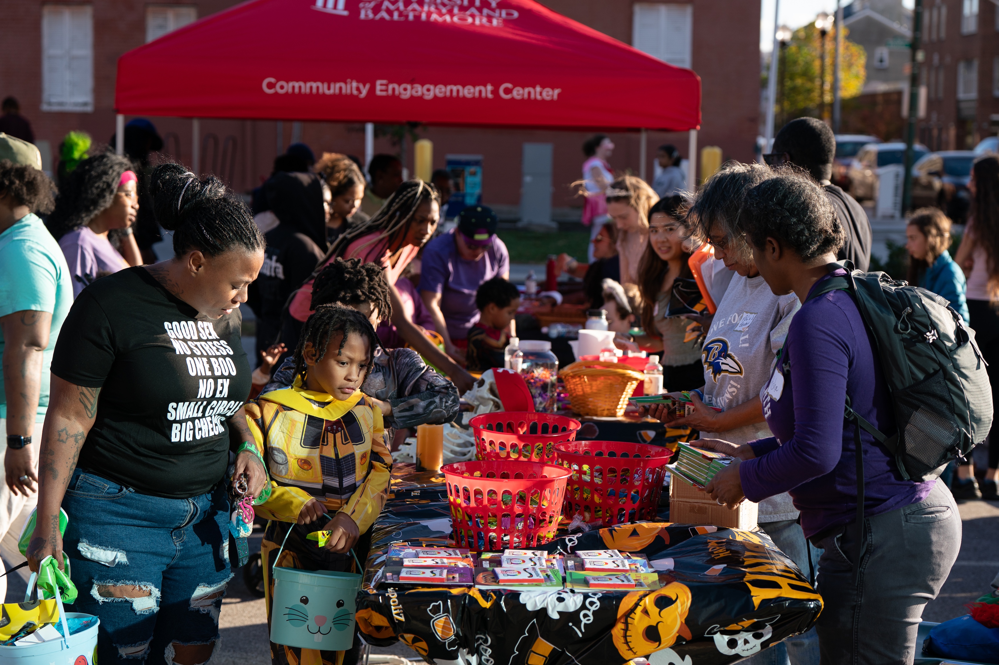 Community members trick or treat