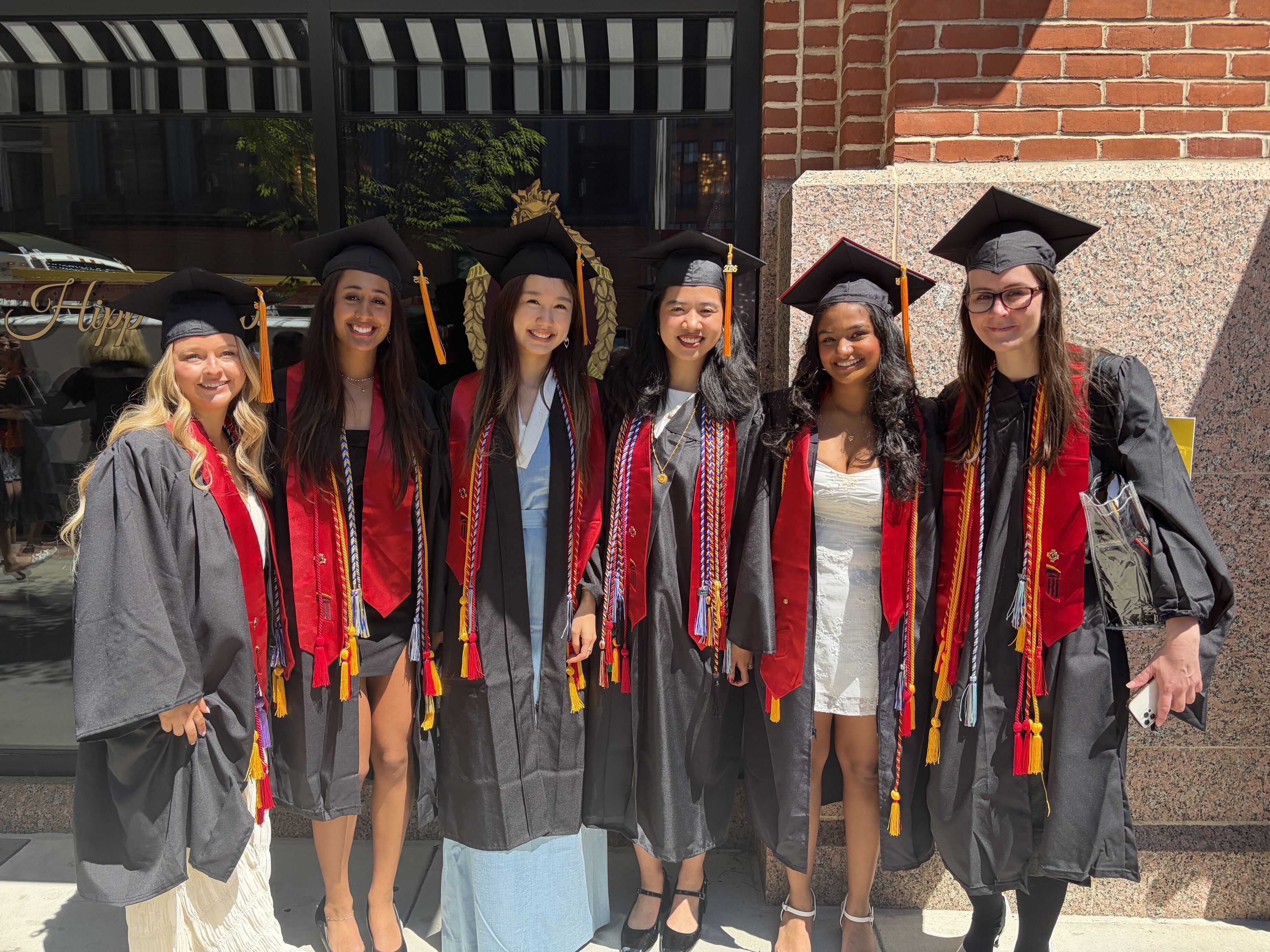 photo of graduating class in graduation regalia