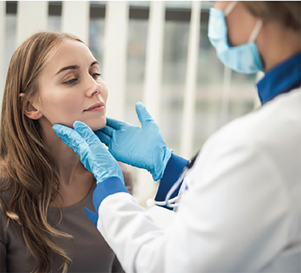 student being examined by a doctor