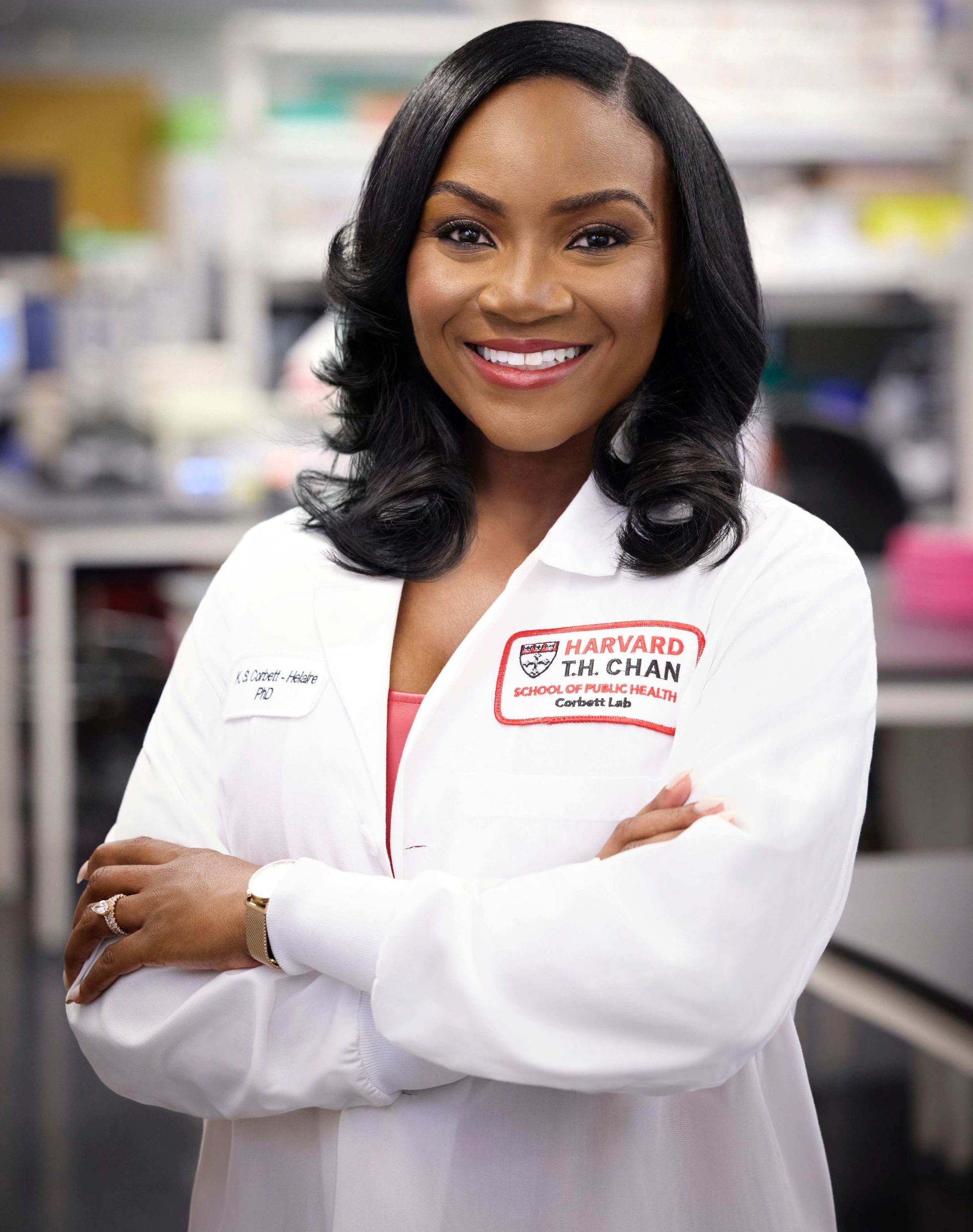 Photo of Dr. Corbett-Helaire in a lab coat