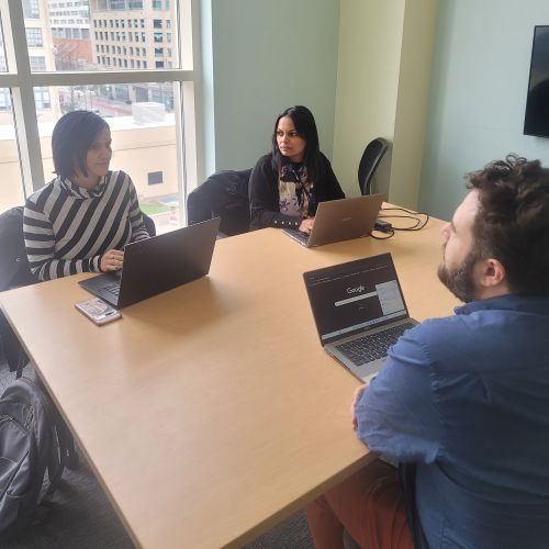 Group of SWAG members writing together