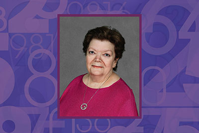 Portrait of Lynn McPherson against a purple abstract background featuring numbers.