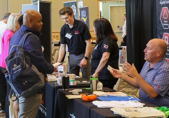 Professionals engaging at a vendor fair