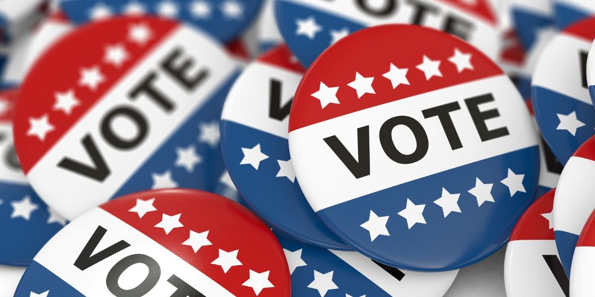 vote pins with red, white, and blue