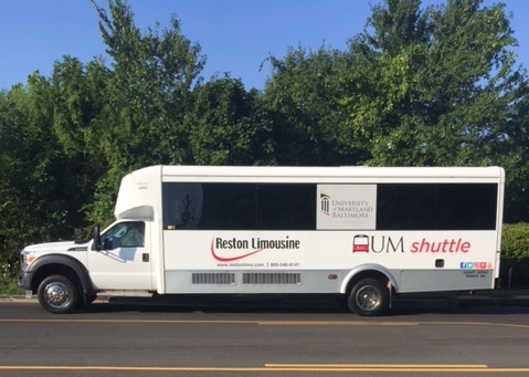 Photo of the new UM shuttle, co-branded between Reston Limousine and the UM shuttle.