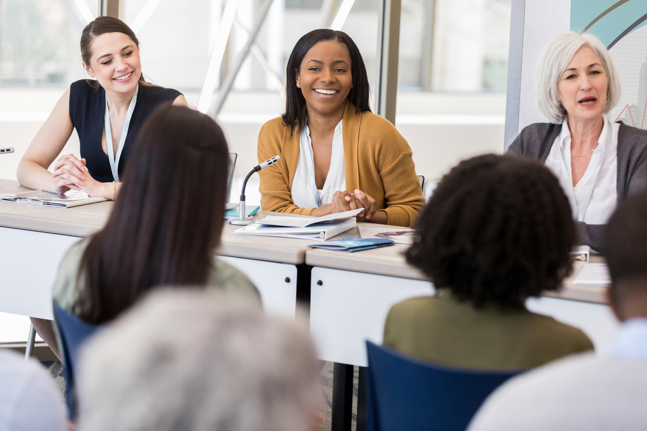 Panel of women at a conference