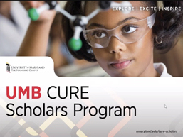 CURE Scholars Program with girl looking at tube