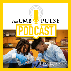 two students working in lab with UMB Pulse graphic