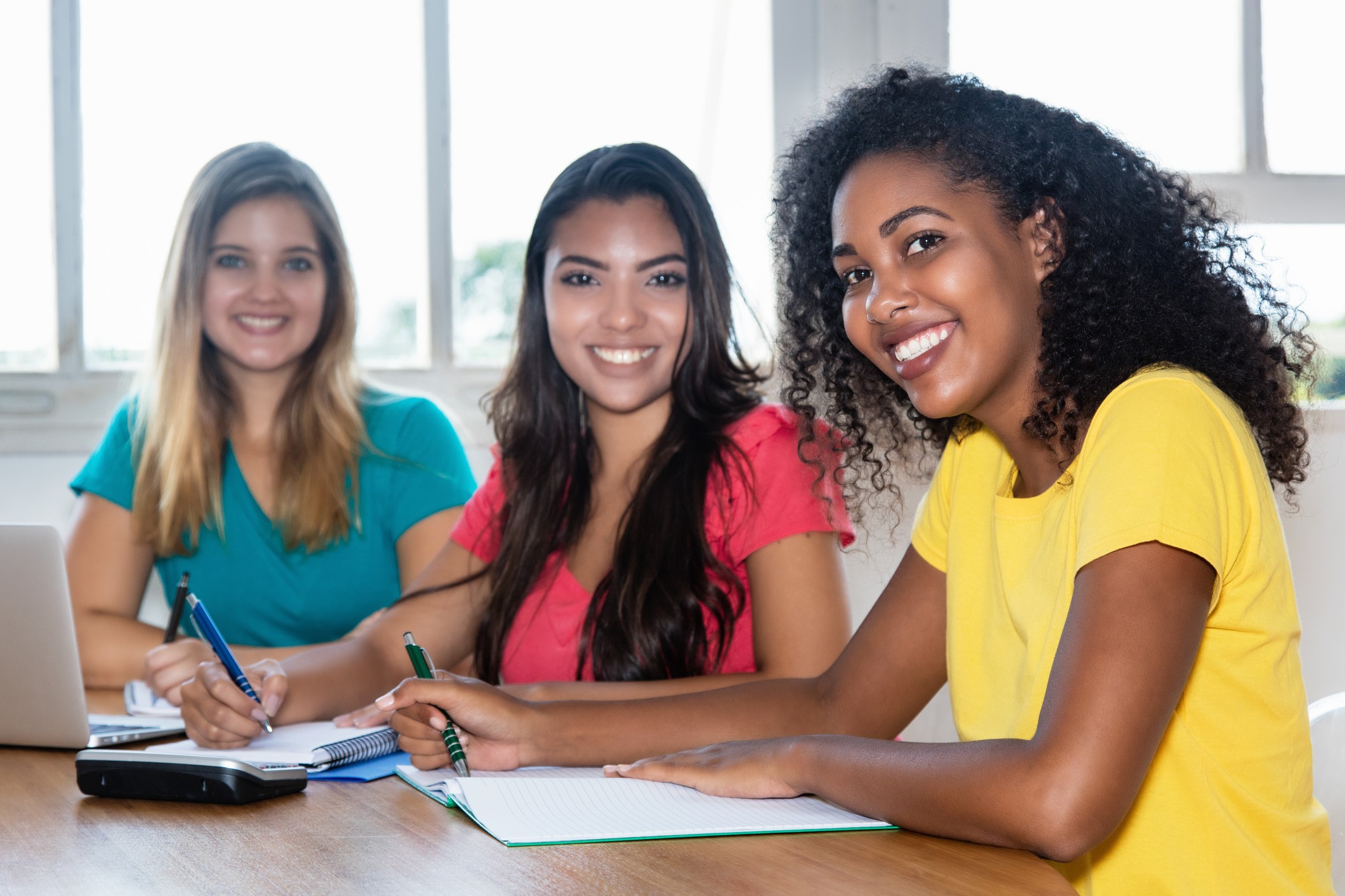 Three smiling women