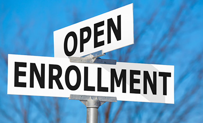 Street sign with Open Enrollment