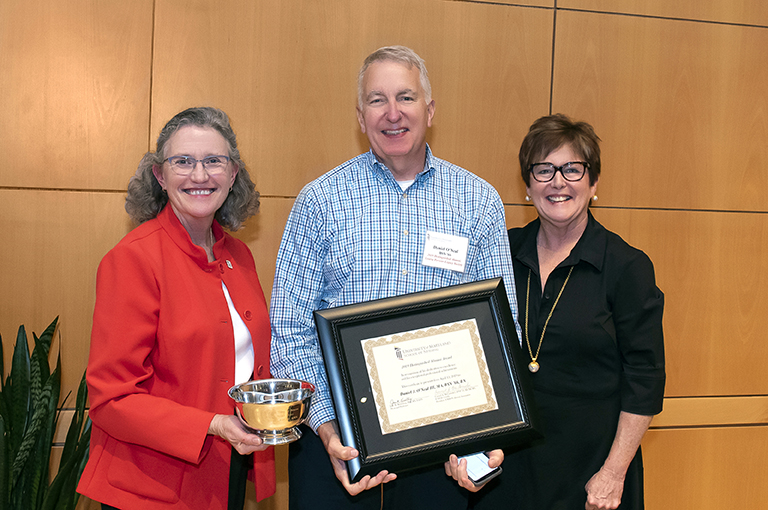 Dean Kirschling, Dan O’Neal III, BSN ’66, and Carmel McComiskey at the All Alumni Reunion