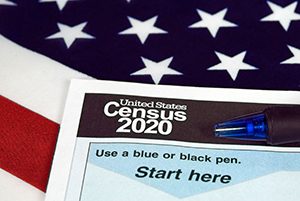 census form overlaid on US flag