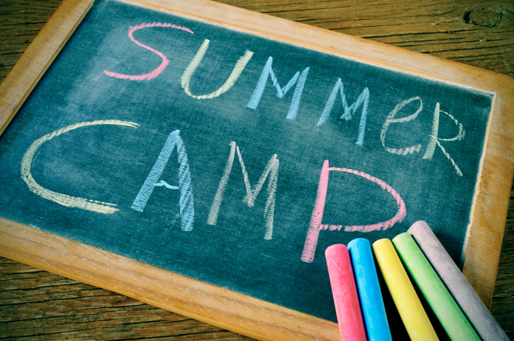 chalk board with Summer Camp written on it