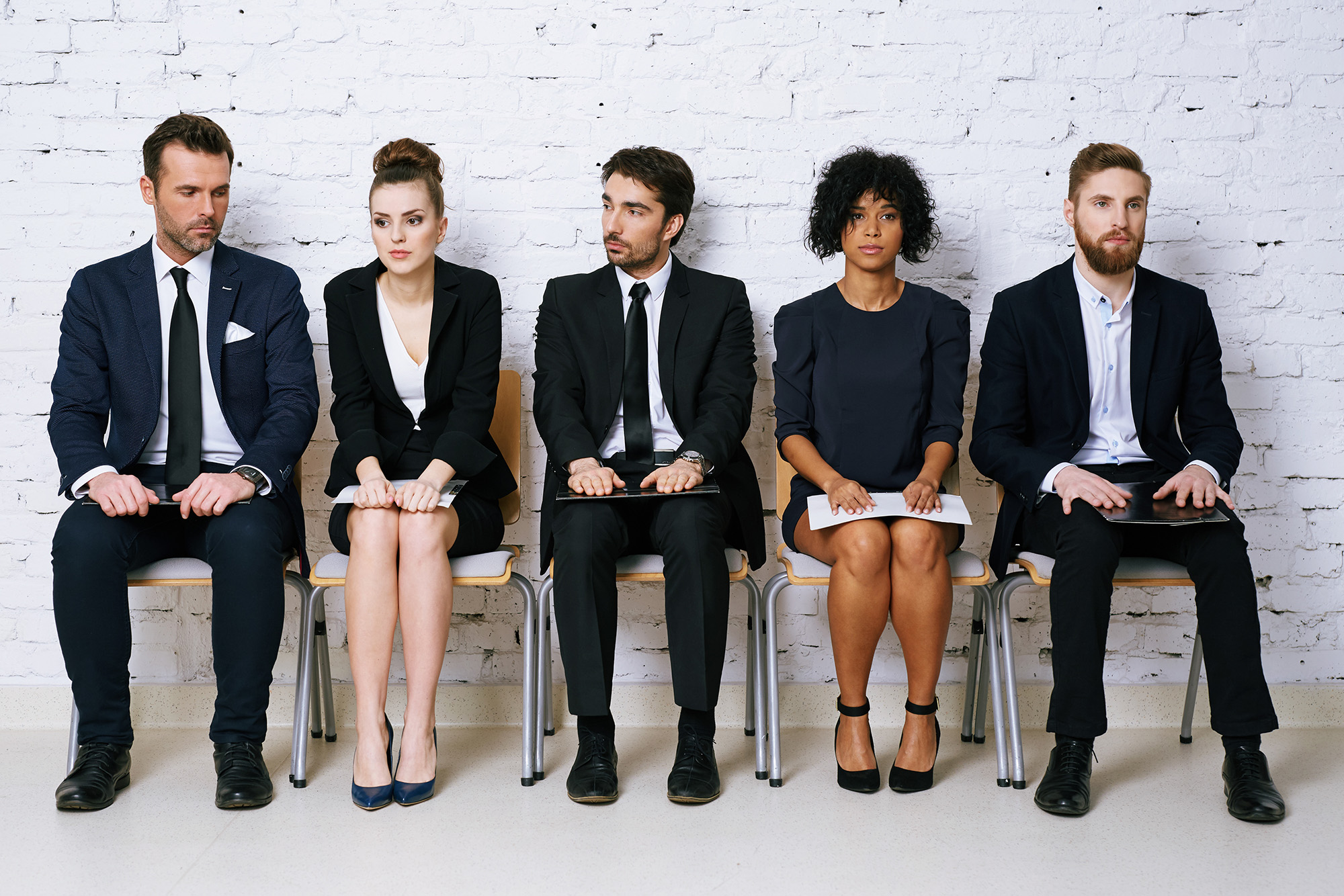 Five people waiting for an interview