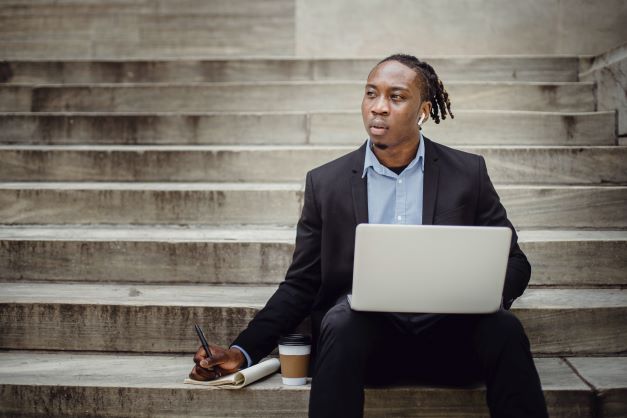 Man sitting with laptop