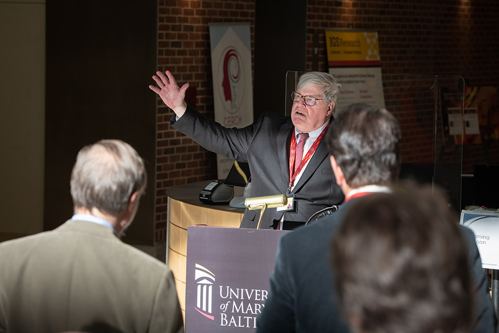 Gregory Ball gestures as he talks during welcome event