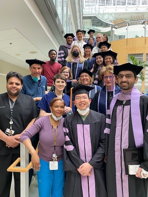  Umar Mian (front row, far right) with friends, faculty, and family members