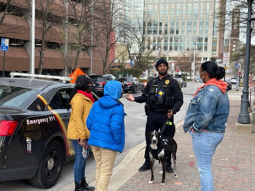 PFC Summers and Poe talk with students at a community event