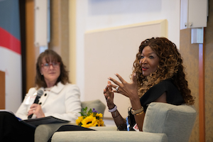 Tamika Tremaglio speaks as Jennifer Litchman looks on