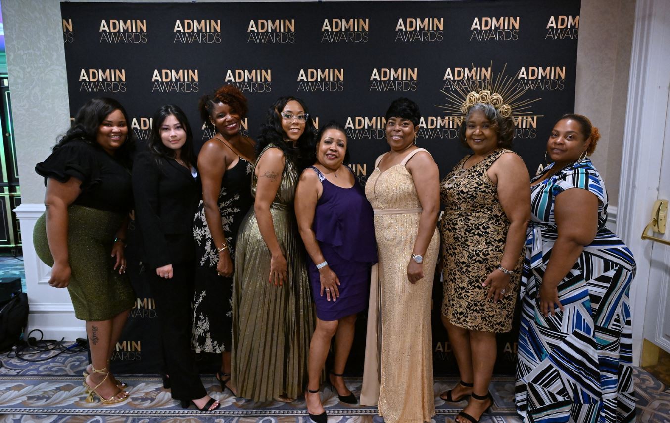 From left, UMB employees Krishauna Greene, Christina Cortese, Danielle Hill, Latoya Ludd, Saifa Poole, Eris Smith, Alvette Chase, and Brittany Johnson attended the “Good as Gold” award ceremon