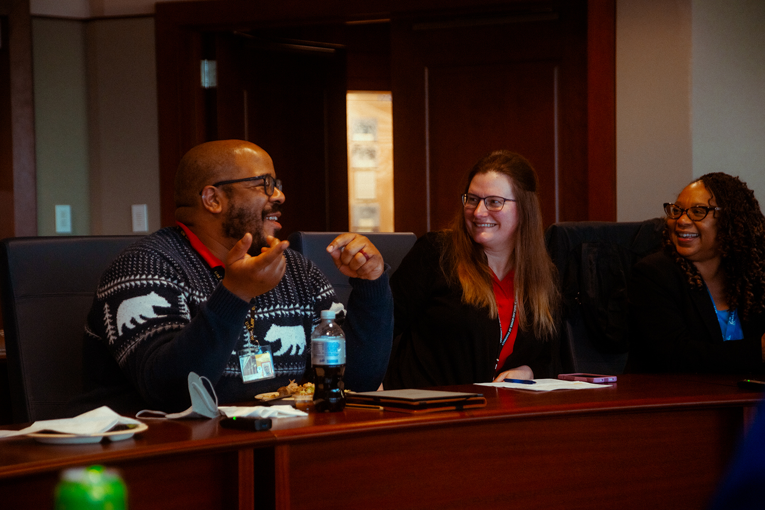 From left, Future of Work Task Force members Aaron Graham, Jill Hamilton, and Chanise Reese-Queen take part in the group’s meeting Jan. 19 in the President’s Boardroom.