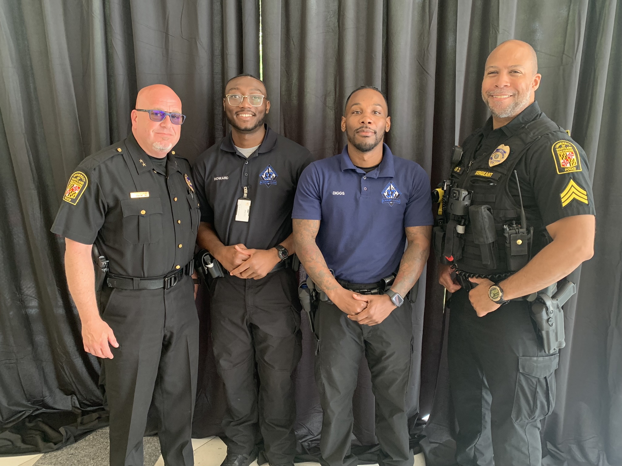 Assistant Chief Chad Ellis, recruit Stephen Howard, recruit Mikal Diggs, and Sgt. Thaddeus Baker
