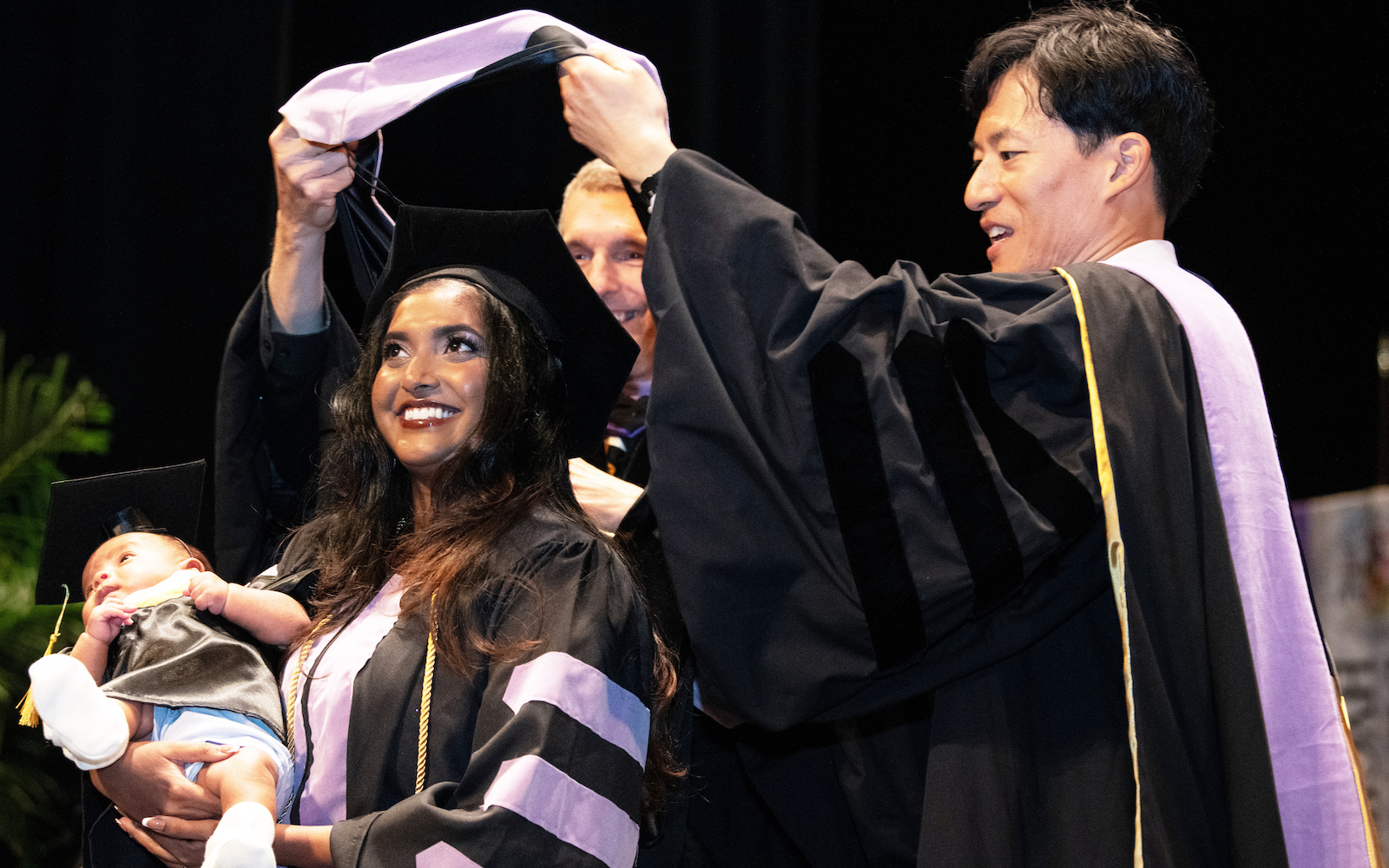 Alisha Neha Karley-De Franco is hooded at UMSOD Convocation