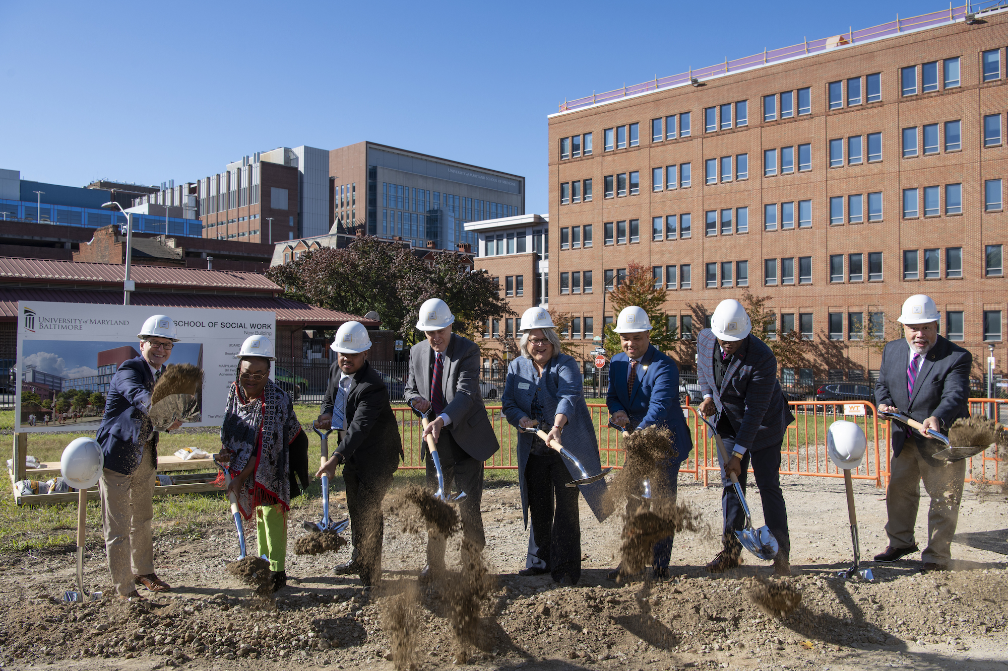 Tim Regan, Karen Brown, Courtney Fullwood, Bruce E. Jarrell, Judy L. Postmus, Antonio L. Hayes, Roger J. Ward, and Bill Henry participate in the groundbreaking