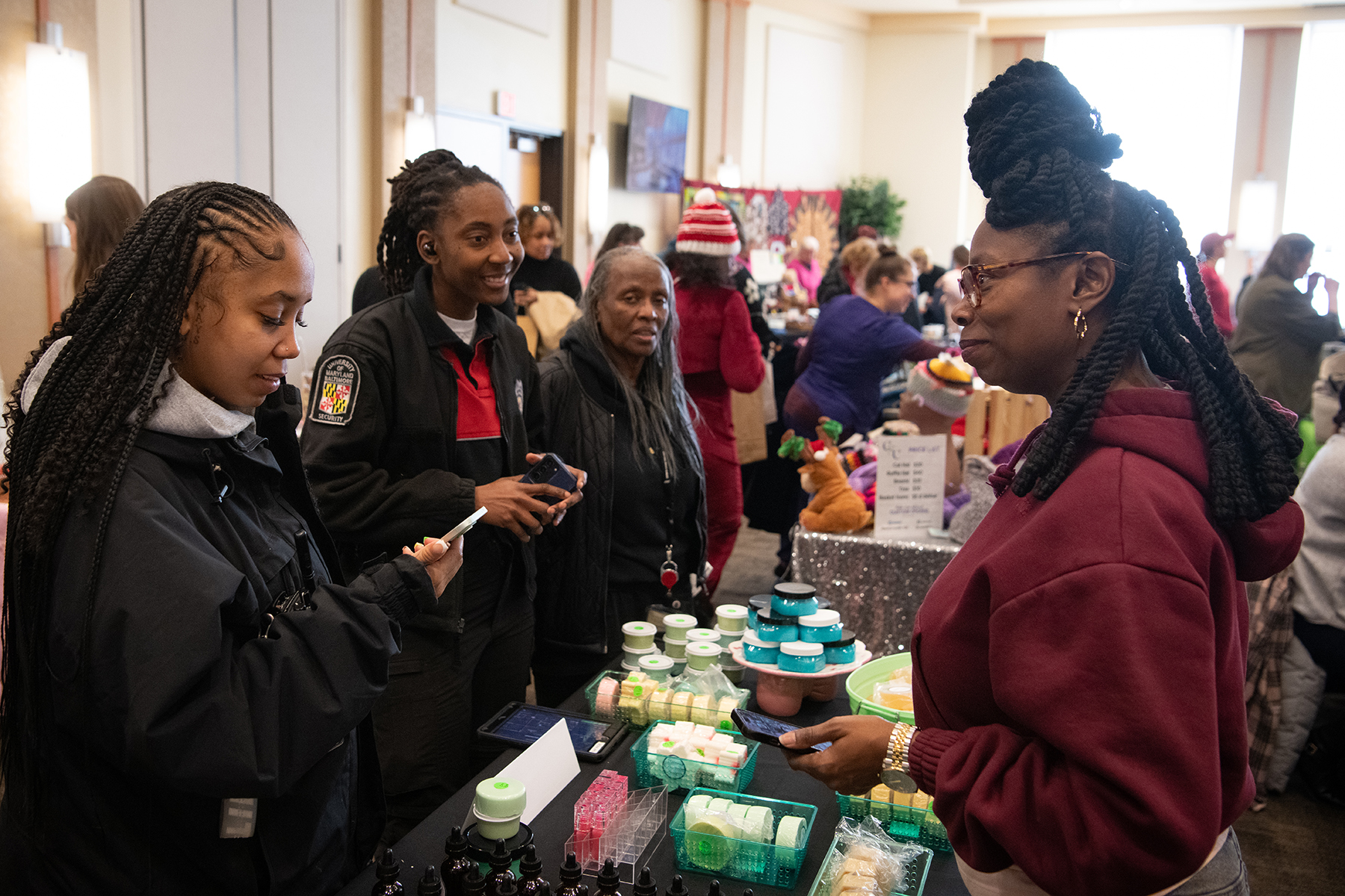 Mary Sterrett shows off her items at the UMB Craft Fair