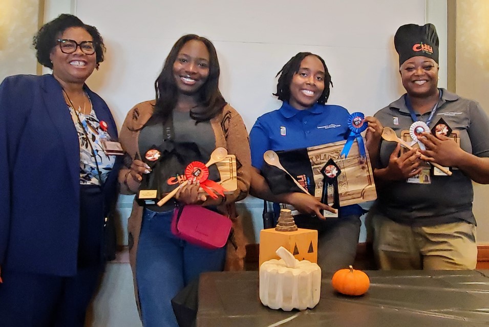 From left to right: Dr. Dawn Rhodes, Sienna Kelly (2nd), DeAsia Thomas (1st), and Dorothy Cole (3rd).