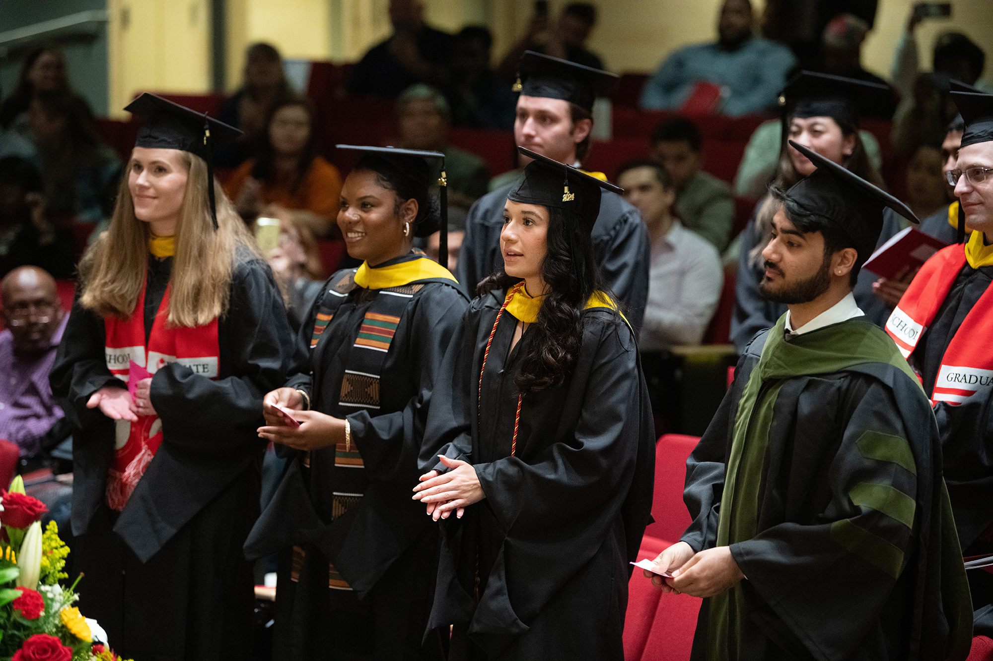 Four graduates of the Graduate School