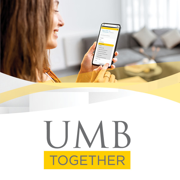woman looking at smart phone, smart phone has text reflective of the HR webpage at UMB