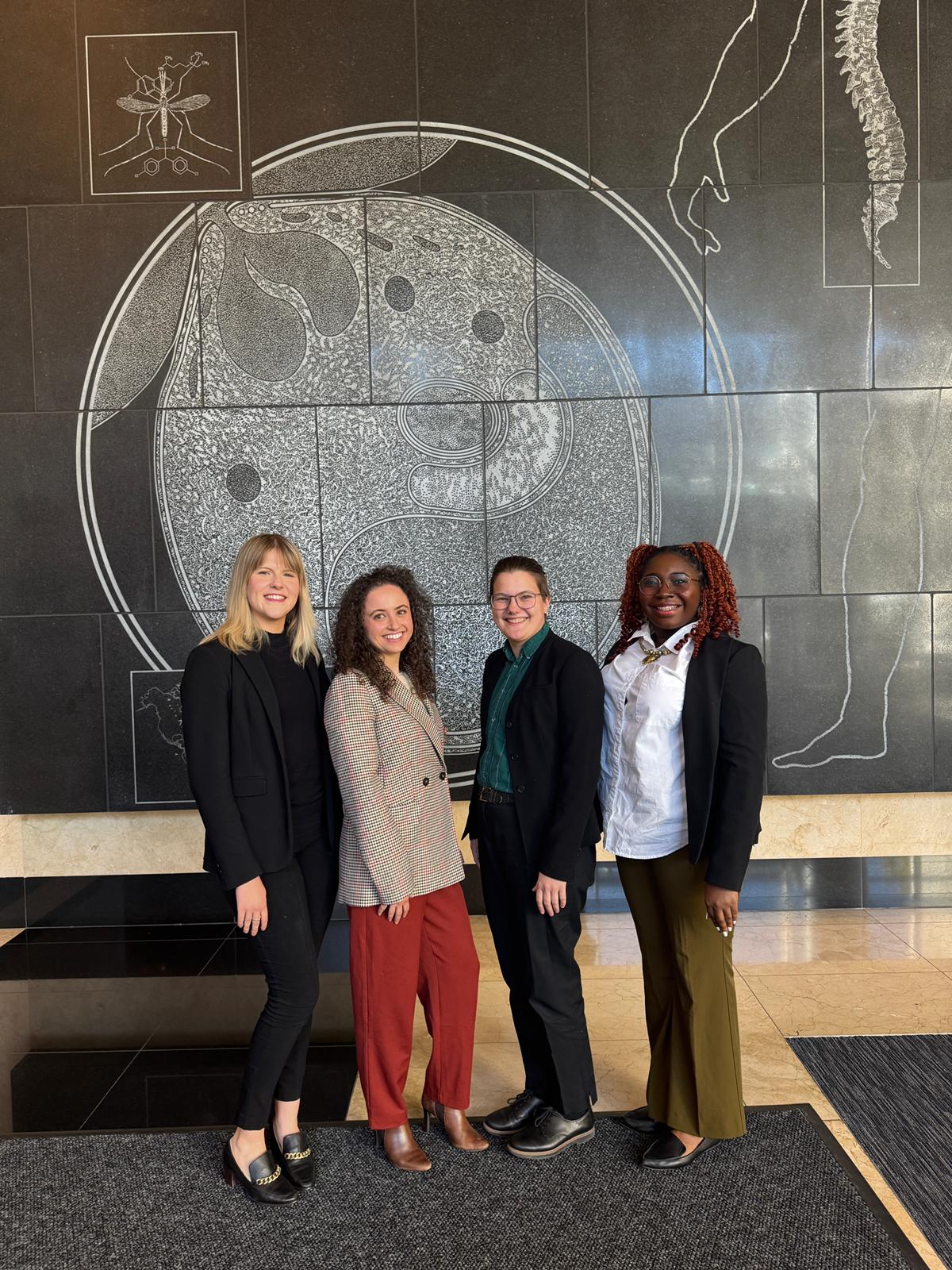 Erika Shook of the School of Medicine, Amanda Saikali of Maryland Carey Law, Alex Boldin of the School of Social Work, and JaNýa Darionna Brown of the School of Medicine.