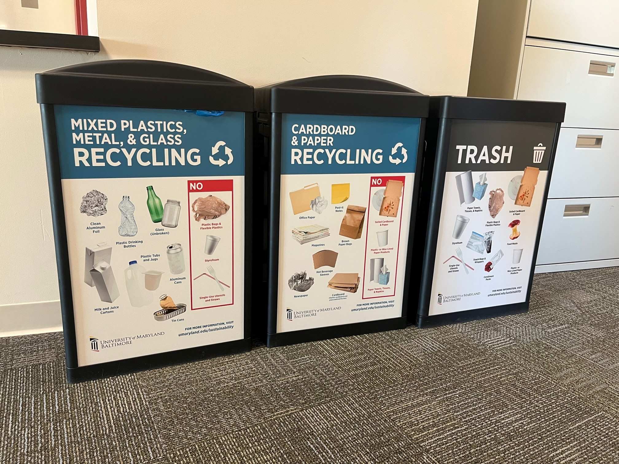 Image of three waste bins next to each other, labeled 