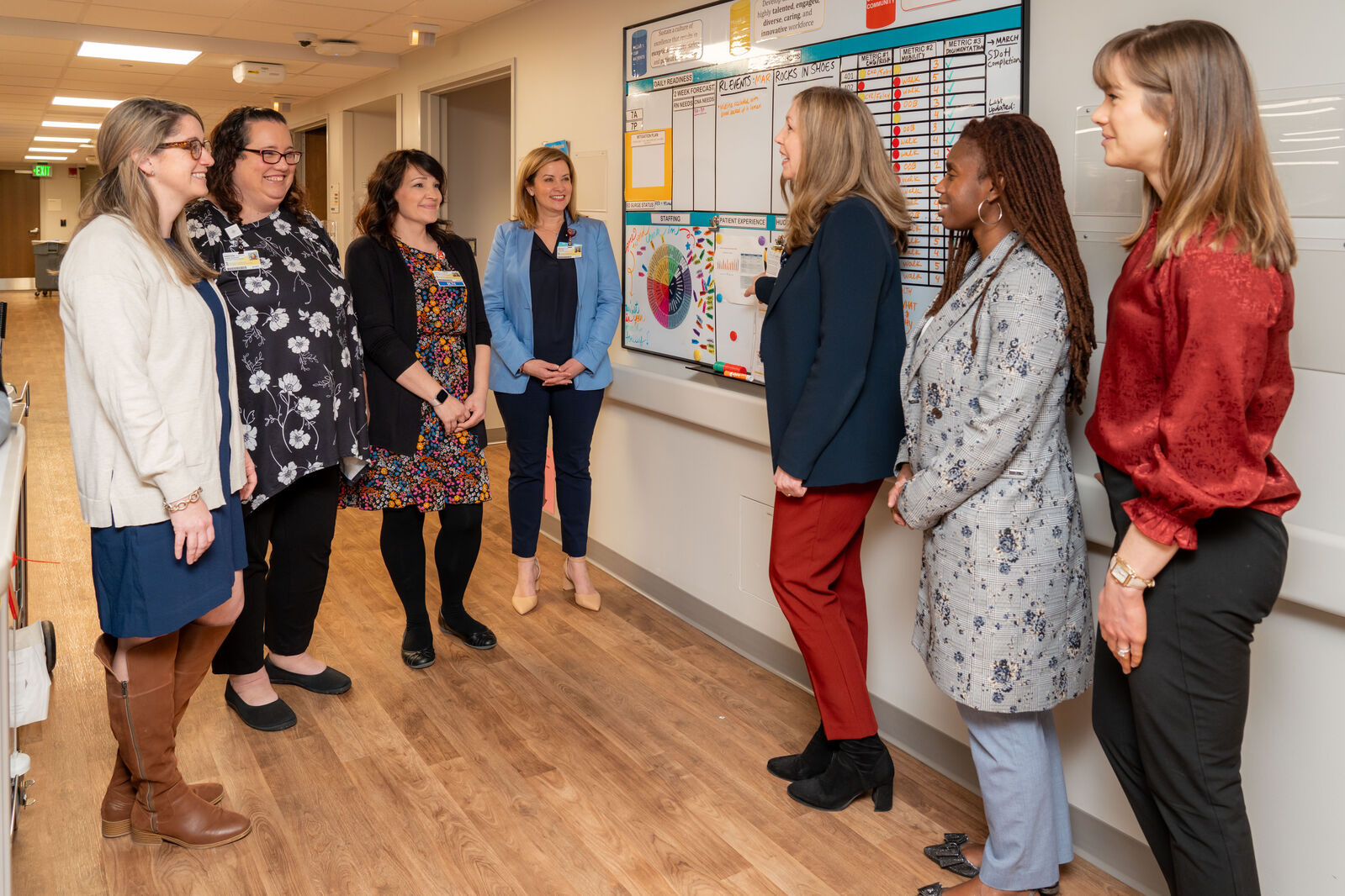 A group of MSN Nursing Leadership and Management alumni pose for a picture