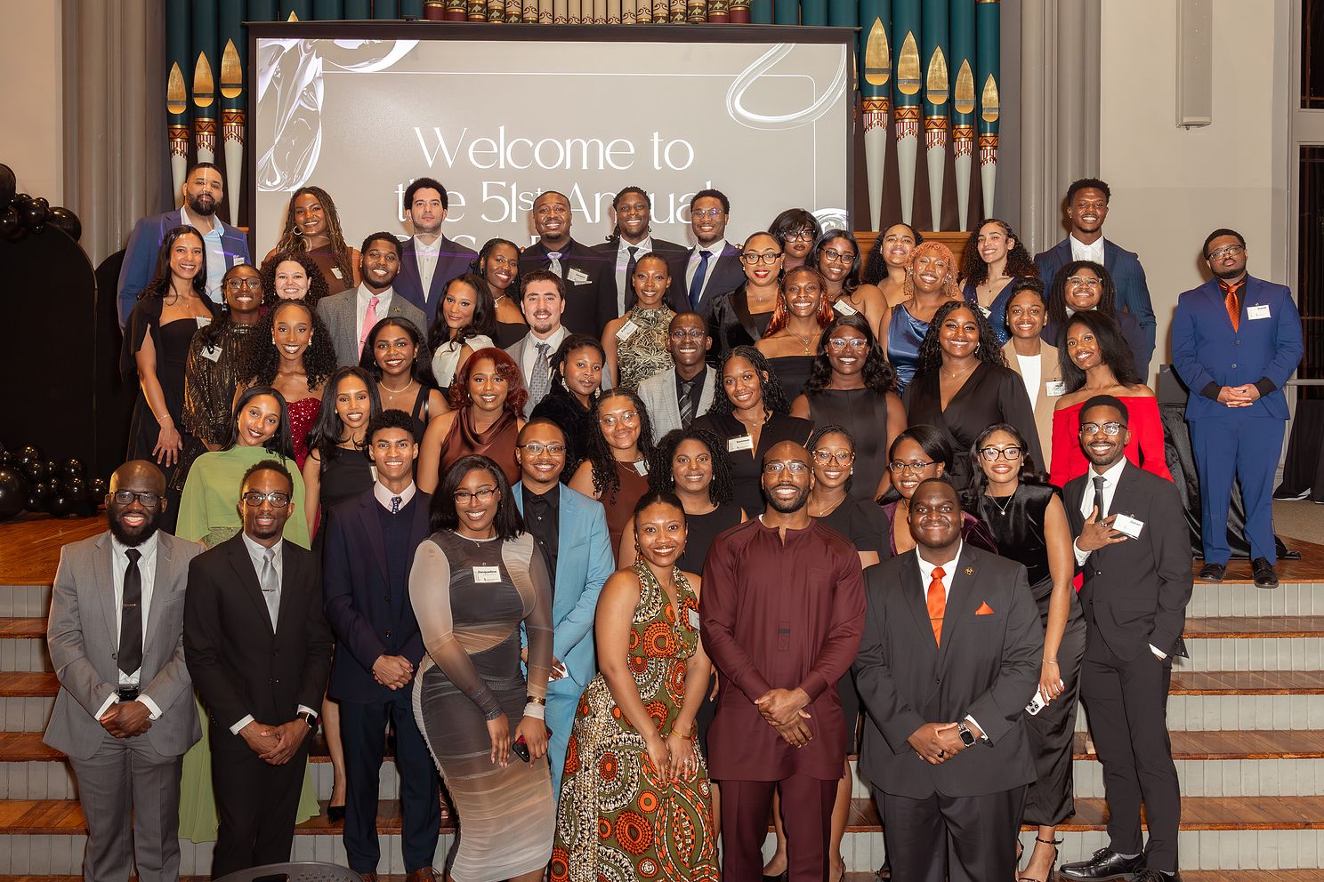 Members of the Black Law Students Association pose for a group shot in Westminster Hall.